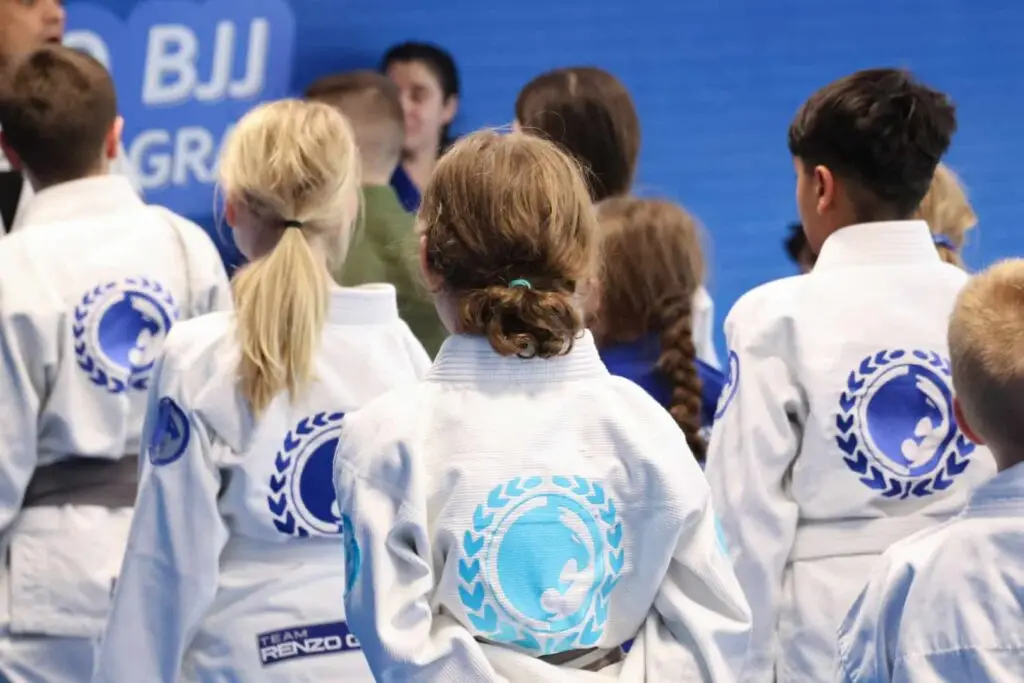 Kids 7-12 Jiu Jitsu Program at Renzo Gracie Latham, Students are lined up at the end of class.